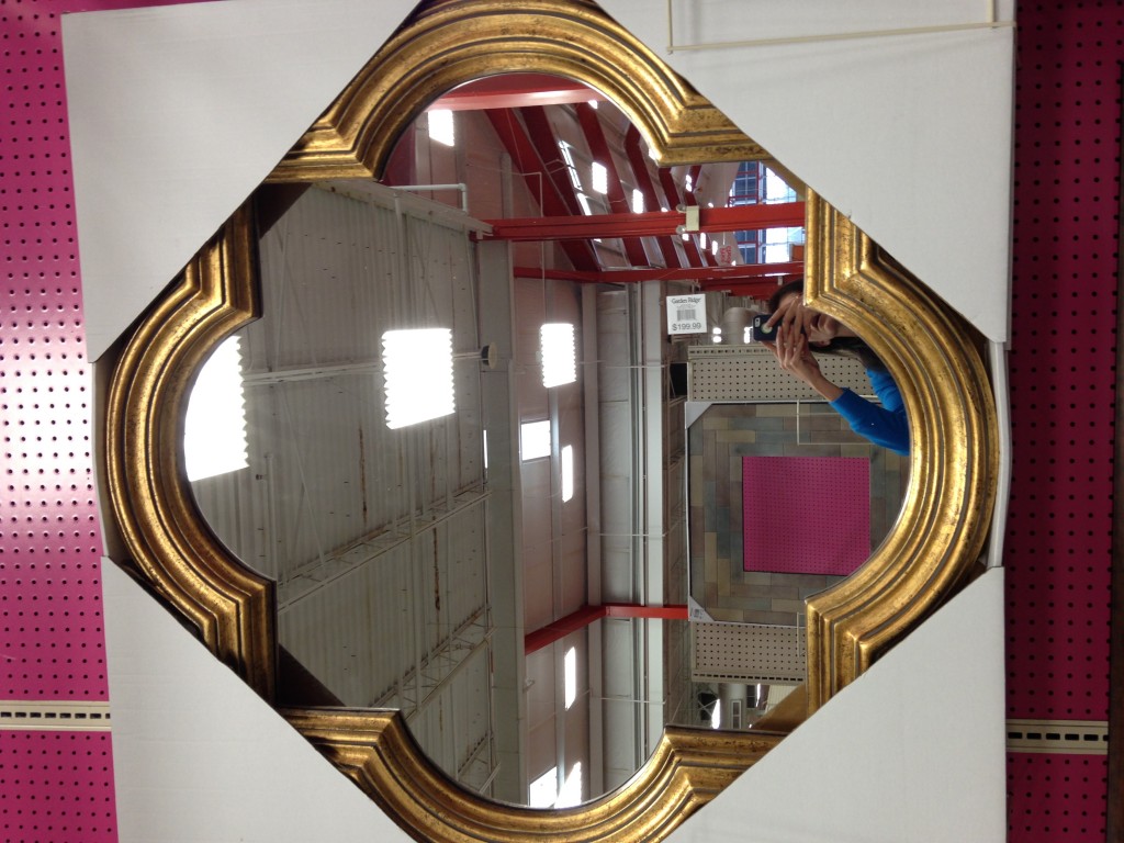 gold quatrofoil mirror